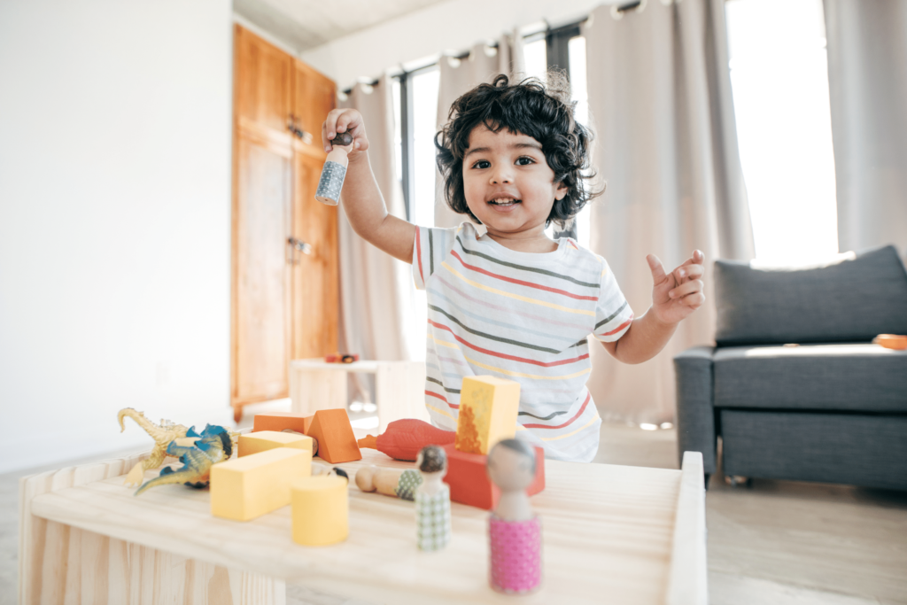 Young child independent play with blocks