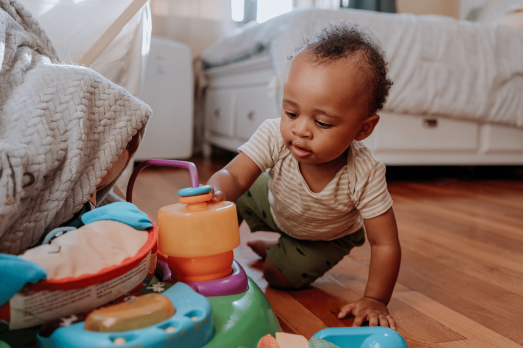 Baby independently playing