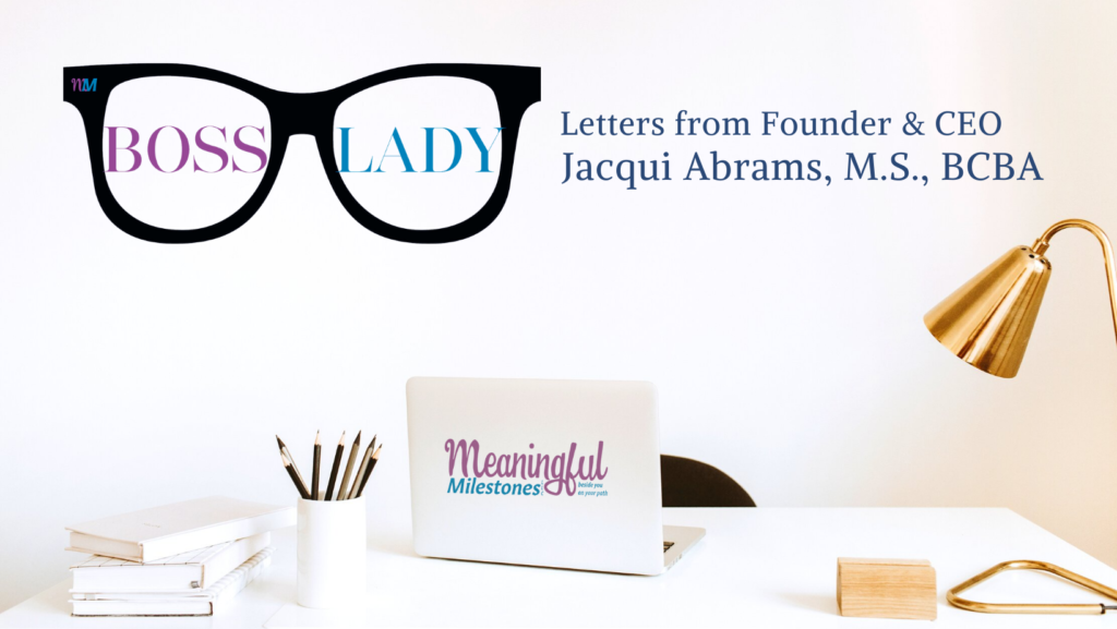 Computer, desk, lamp, title graphic for Letter from Jacqui Abrams CEO